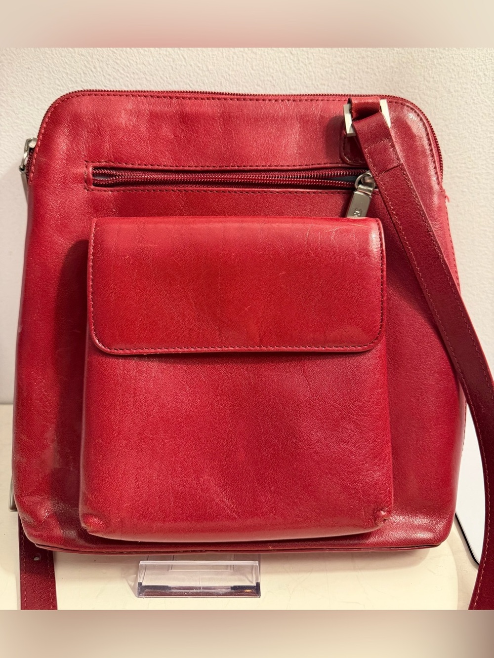 Hobo International red leather crossbody bag.